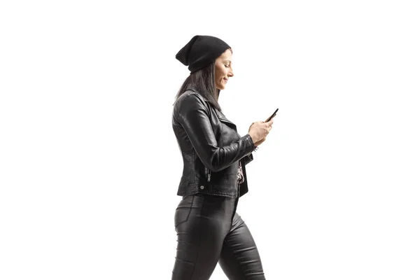Profile Shot Woman Leather Clothes Walking Looking Mobile Phone Isolated — ストック写真