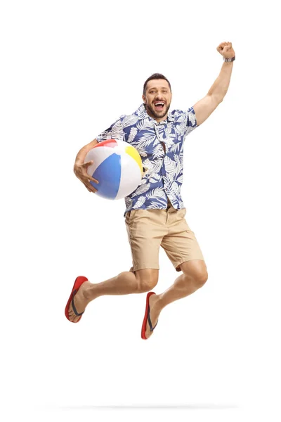 Full Length Shot Young Excited Male Tourist Holding Ball Jumping — 图库照片