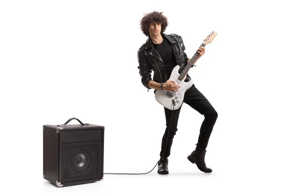 Full Length Portrait Young Rock Musician Playing Guitar Plugged Amplifier — Stok fotoğraf