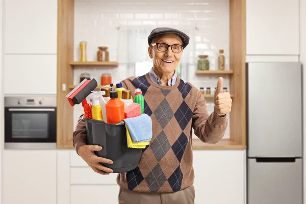 Elderly Man Holding Bucket Cleaning Supplies Gesturing Thumbs Kitchen — Photo