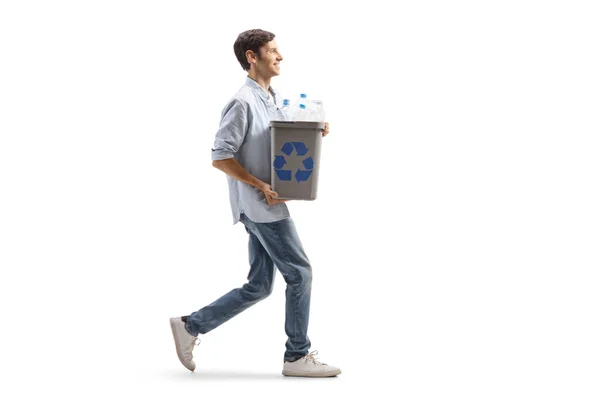 Young Man Walking Carrying Recycling Bin Plastic Bottles Isolated White — ストック写真