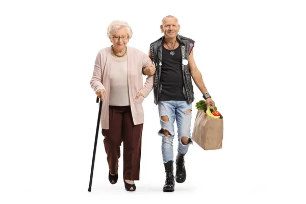 Muž Drží Starší Žena Podpaží Nese Její Sáček Potravinami Izolované — Stock fotografie
