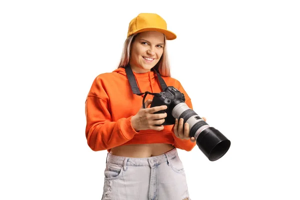 Young Trendy Female Holding Professional Camera Isolated White Background — Zdjęcie stockowe