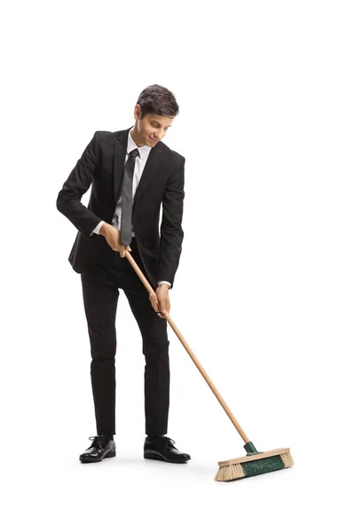 Businessman Sweeping Broom Isolated White Background — Stok fotoğraf