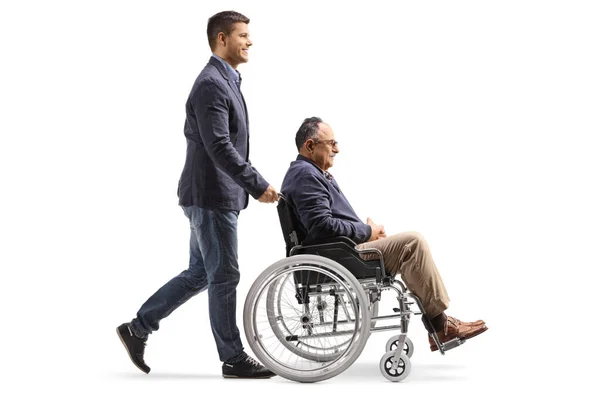 Full Length Profile Shot Son Walking Pushing Mature Man Wheelchair — Photo