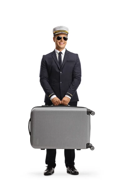 Pilot Carrying Suitcase Showing Something Hand Isolated White Background — Zdjęcie stockowe