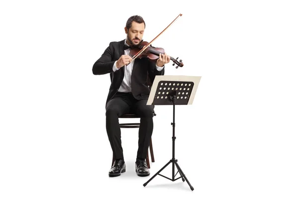Full Length Portrait Elegant Man Sitting Playing Violin Music Stand — Stok fotoğraf