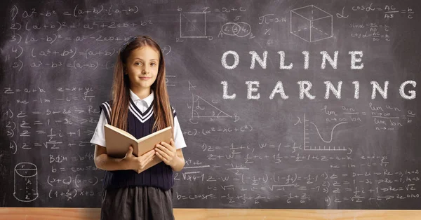 Schoolgirl Book Standing Front Blackboard Text Online Learning — Stok fotoğraf