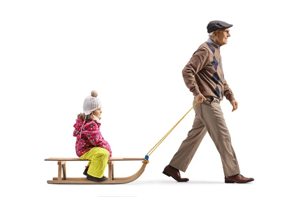 Full Length Profile Shot Grandfather Walking Pulling Girl Sled Isolated — Stock Photo, Image