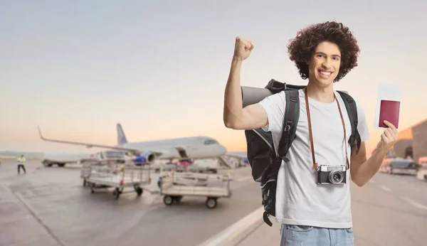 Young Male Tourist Backpack Showing Passport Gesturing Happiness Airport Apron — Zdjęcie stockowe