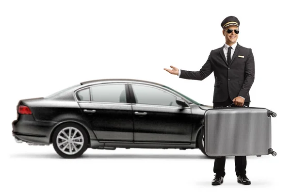 Chauffeur Carrying Suitcase Pointing Black Car His Hand Isolated White — ストック写真