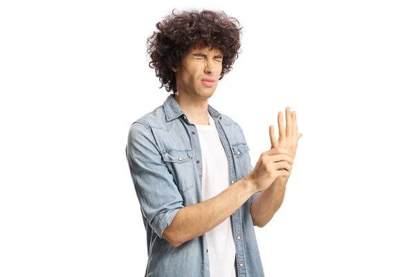 Young Man Suffering Arthritis Holding His Painful Palm Isolated White — Stok fotoğraf