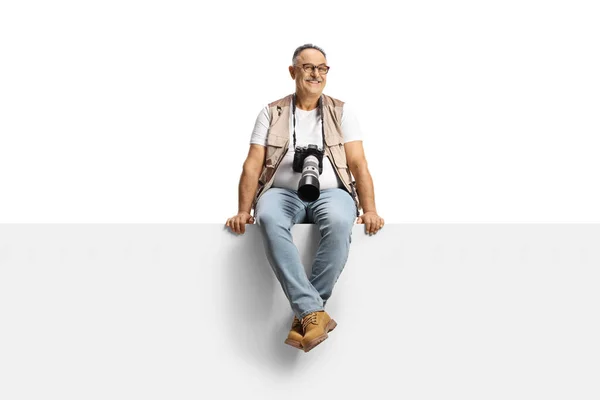 Photographer Camera Sitting Blank Panel Smiling Camera Isolated White Background — Stock fotografie