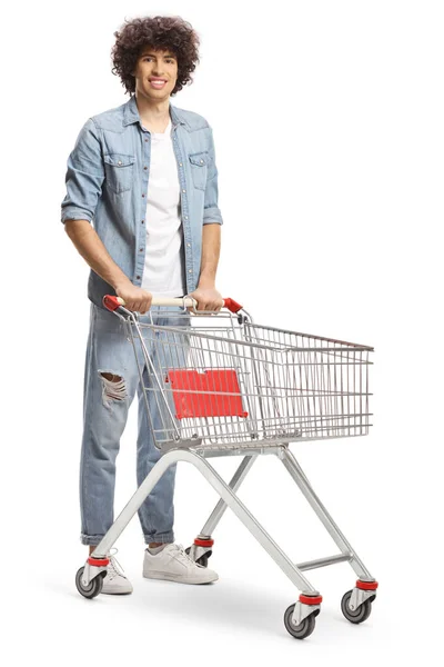 Guy Curly Hair Standing Empty Shopping Cart Isolated White Background — Foto Stock