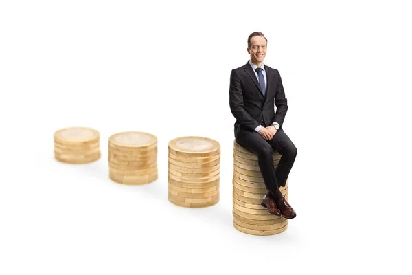 Professional Man Suit Tie Sitting Pile Coins Looking Camera Isolated — Stock fotografie