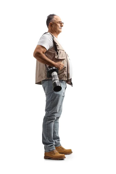 Full Length Profile Shot Mature Male Photographer Carrying Camera Isolated — Fotografia de Stock