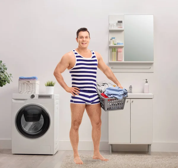 Full Length Portrait Young Man Underwear Holding Laundry Basket Bathroom — Stock Photo, Image