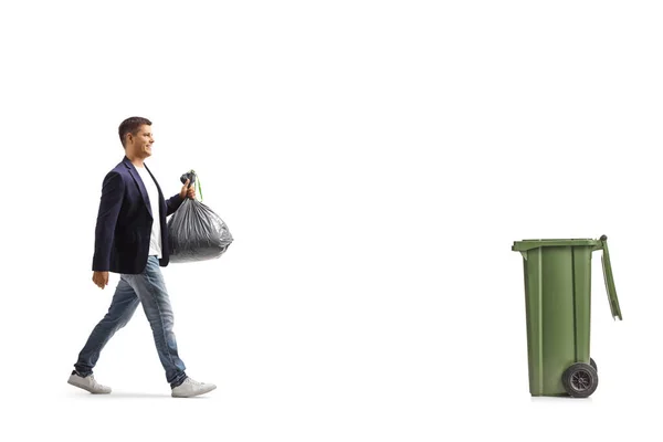 Full Length Profile Shot Man Walking Bin Carrying Plastic Waste — Zdjęcie stockowe