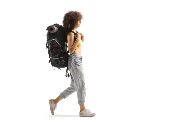 Full Length Profile Young Female Backpacker Walking Isolated White Background — Zdjęcie stockowe