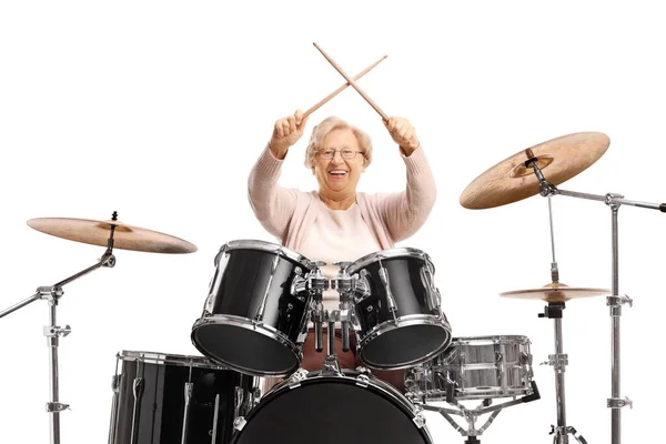 Cheerful Elderly Woman Holding Crossed Drumsticks Set Drums Isolated White — Foto Stock