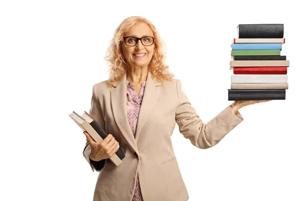 Female Teacher Holding Books Pile Books One Hand Smiling Isolated — Stockfoto