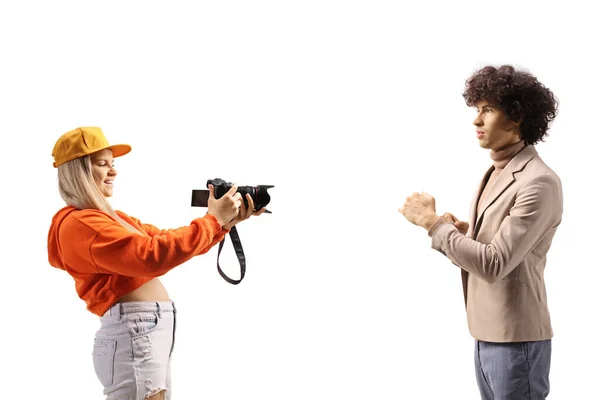 Young Female Photographer Taking Photo Male Model Isolated White Background — ストック写真