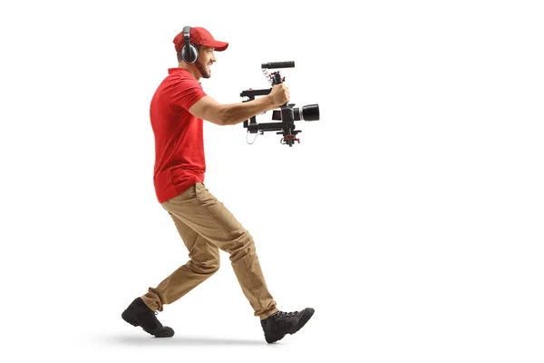 Full Length Profile Shot Camera Operator Using Stabilizer Recording Camera — Fotografia de Stock