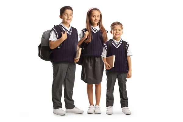 Двоє Хлопчиків Одна Дівчина Шкільній Формі Носять Рюкзаки Ізольовані Білому — стокове фото