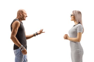 Profile shot of a male hipster talking to a young blond woman isolated on white background