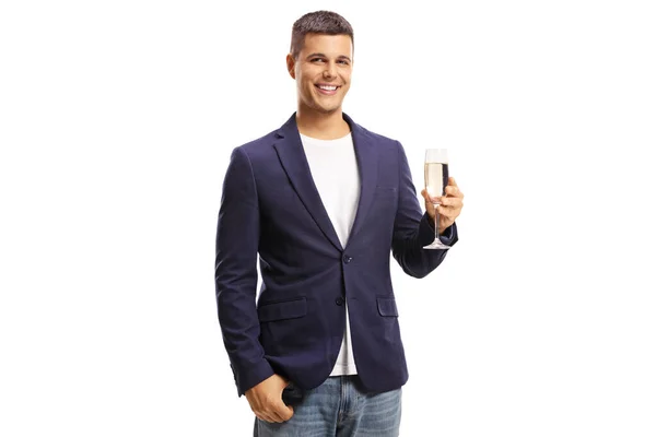 Jongeman Met Een Glas Champagne Glimlachend Geïsoleerd Witte Achtergrond — Stockfoto