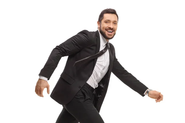 Bonito Homem Alegre Terno Preto Correndo Olhando Para Câmera Isolada — Fotografia de Stock