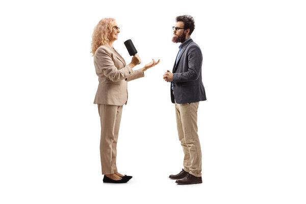 Female reporter interviewing a man isolated on white background