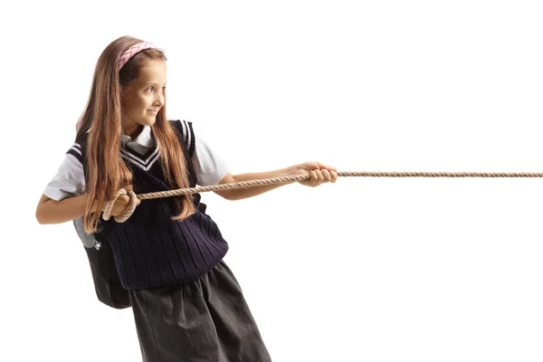 Menina Uniforme Escolar Puxando Uma Corda Isolada Fundo Branco — Fotografia de Stock