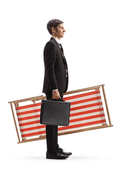 Full Length Profile Shot Businessman Carrying Beach Chair Briefcase Isolated — Stock Photo, Image