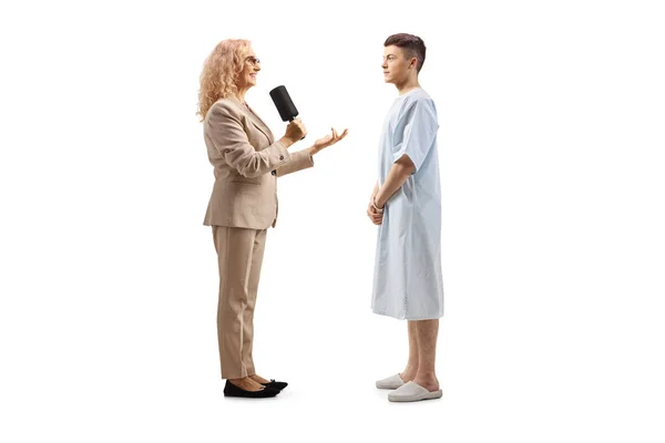 Female Reporter Interviewing Young Male Hospitalized Patient Isolated White Background — Stock Photo, Image