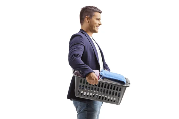 Profile Shot Young Man Standing Laundry Basket Isolated White Background — Stock Photo, Image