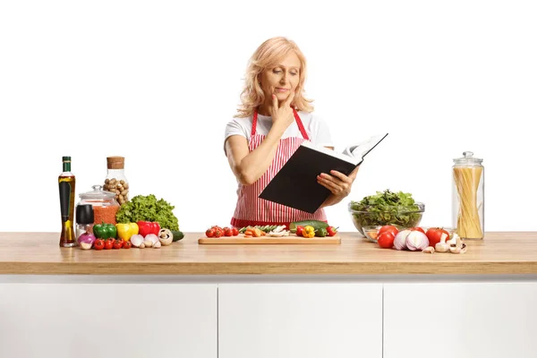 Housewife Behinf Kitchen Counter Holding Cook Book Thinking What Cook — Stock Photo, Image