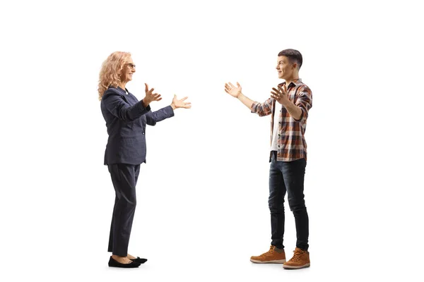 Full Length Profile Shot Woman Meeting Greeting Male Teenager Isolated — Stock Photo, Image