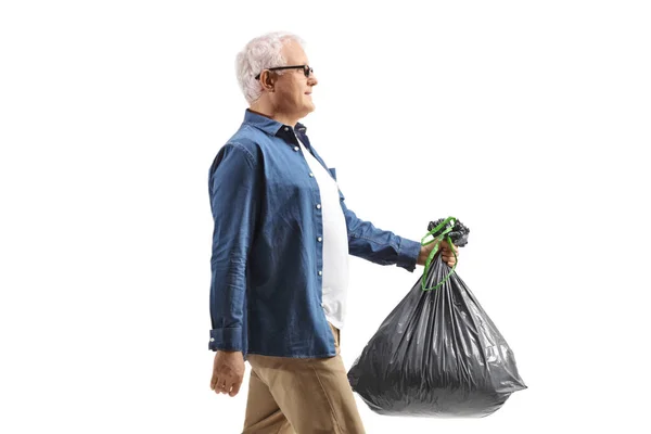 Profile Shot Mature Man Walking Carrying Plastic Waste Bag Isolated — Stock Photo, Image