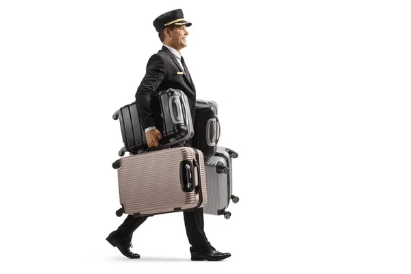 Full Length Profile Shot Bellboy Walking Carrying Many Suitcases Isolated — Zdjęcie stockowe