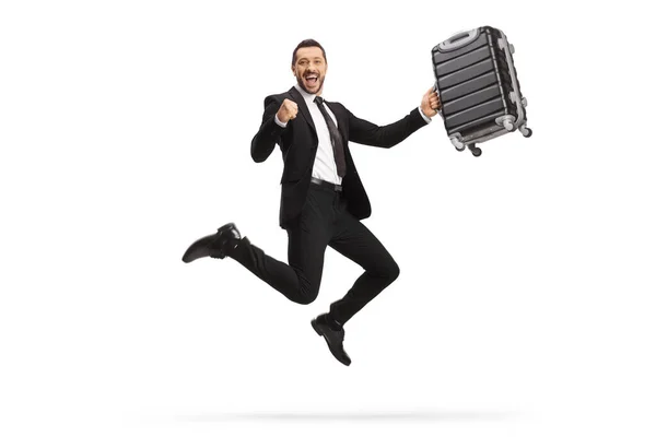 Full Length Portrait Excited Businessman Holding Suitcase Jumping Isolated White — Stock Photo, Image