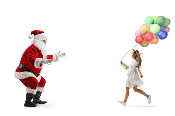 Balonlu Bir Kızın Beyaz Arka Planda Noel Baba Doğru Koşarken — Stok fotoğraf