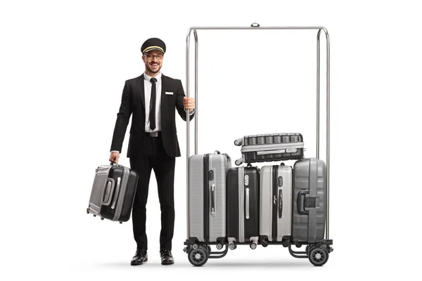 Bellboy Suitcases Standing Next Luggage Cart Isolated White Background — Stock Photo, Image