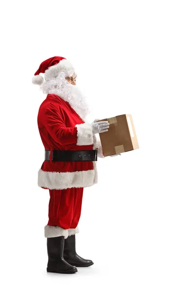 Full Length Profile Shot Santa Claus Delivering Cardboard Box Package — Stock Photo, Image