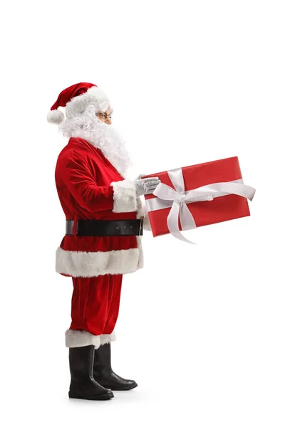 Perfil Comprimento Total Tiro Santa Claus Segurando Grande Presente Isolado — Fotografia de Stock