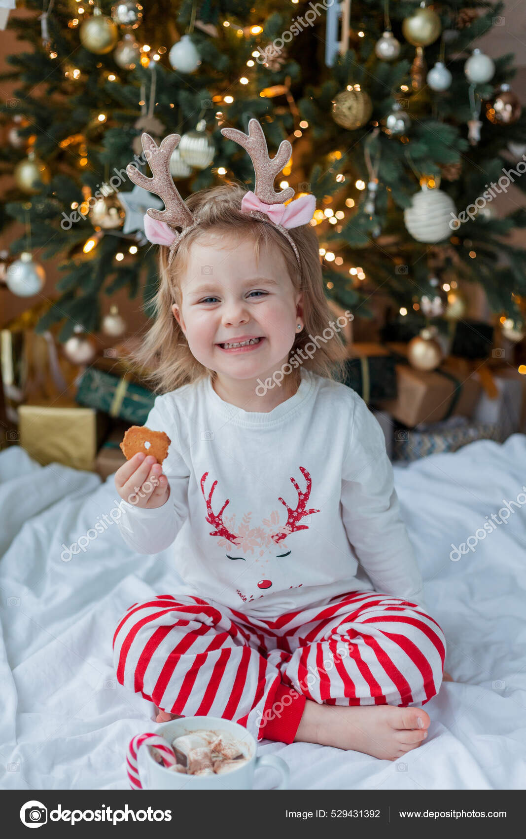 Adorable Year Old Girl Festive Pajamas Sits Christmas Tree Holding Stock Photo Karelia89 529431392