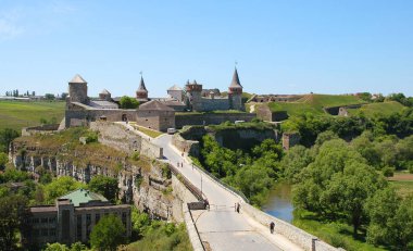 Kamyanets Podilskyi, Ukraine: Kamianets-Podilskyi Castle, the main tourist attraction of the city. Wide view of the castle with bridge leading to the structure.