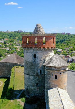 Kamyanets Podilskyi, Ukraine: Kamianets-Podilskyi Castle, the main tourist attraction of the city. View of the castle wall and tower with the city behind.