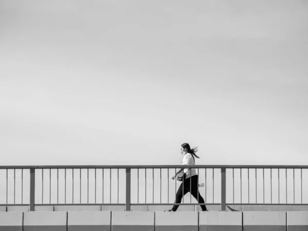 Bucharest Romania 2022 Woman Crossing Bridge Abstract Minimalist Photography — Stock Photo, Image