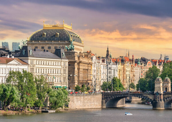 Prague, Czech Republic - June 2022: Beautiful view at sunset with the magnificent building of the National Theatre opera house(Narodni divadlo). Renaissance architecture in Prague